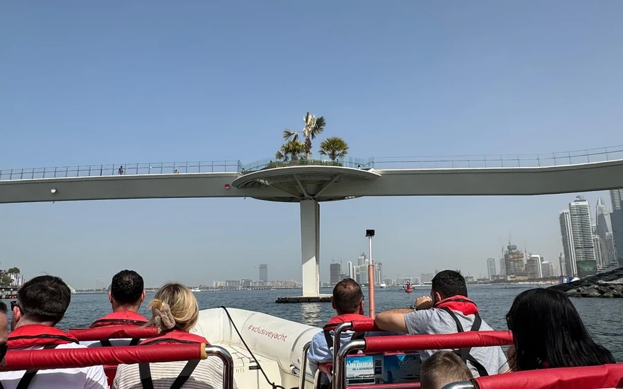 A speedboat passing Atlantis The Palm on the Dubai coast