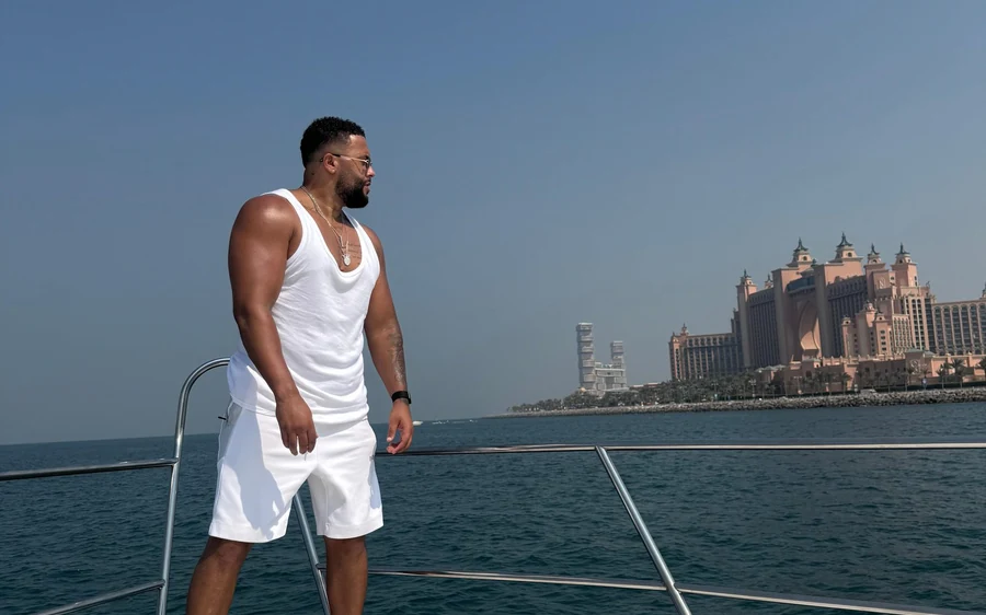 A fifty-foot yacht on the water in Dubai Marina